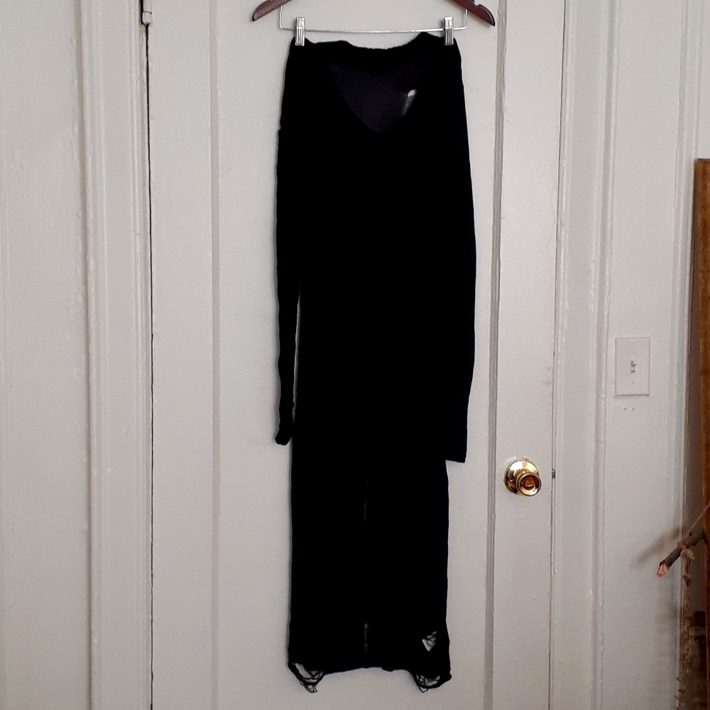 Long sleeve distressed knitted sweater